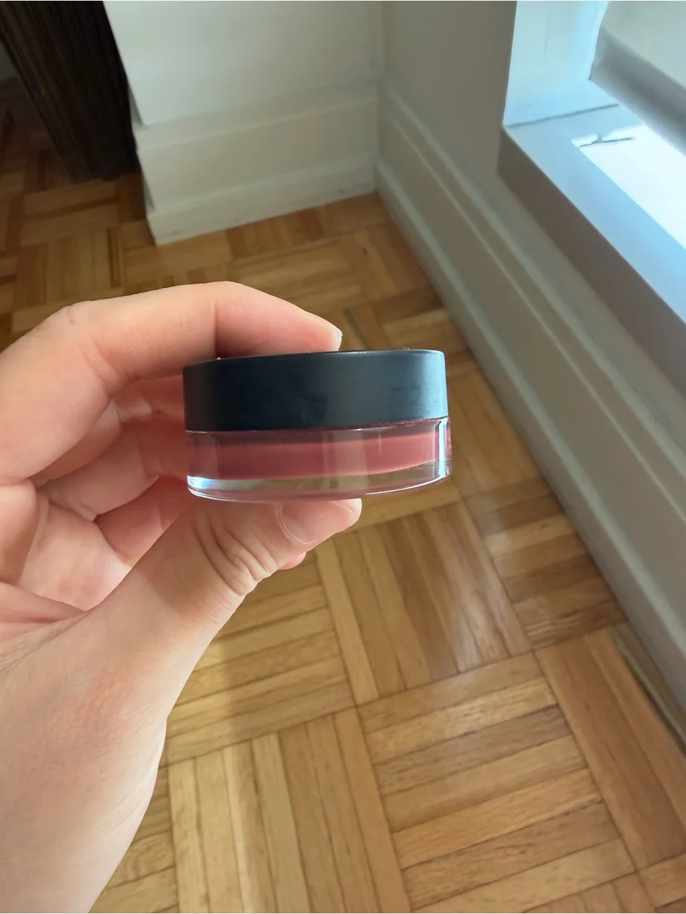 CHANEL Black Round Compact with Raised CC Emblem